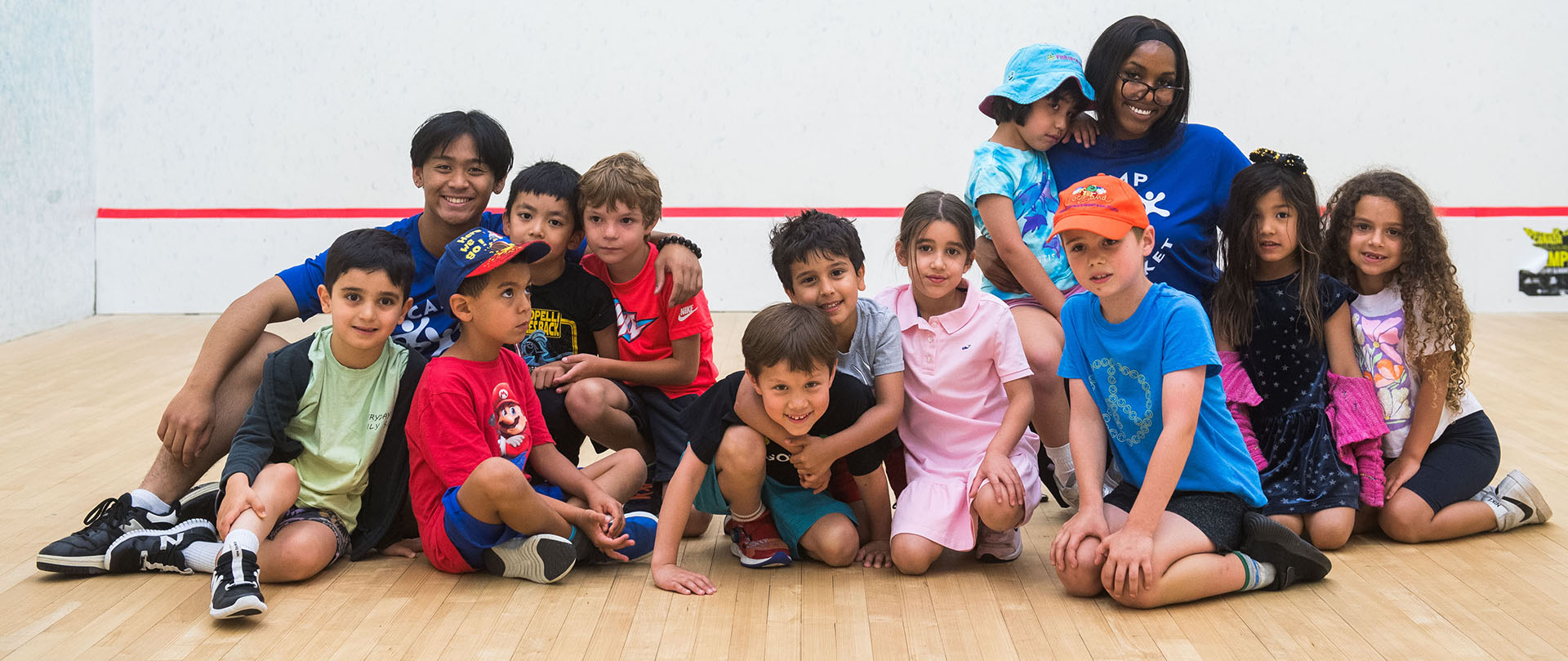 Children with Camp counsellors at Camp Cricket